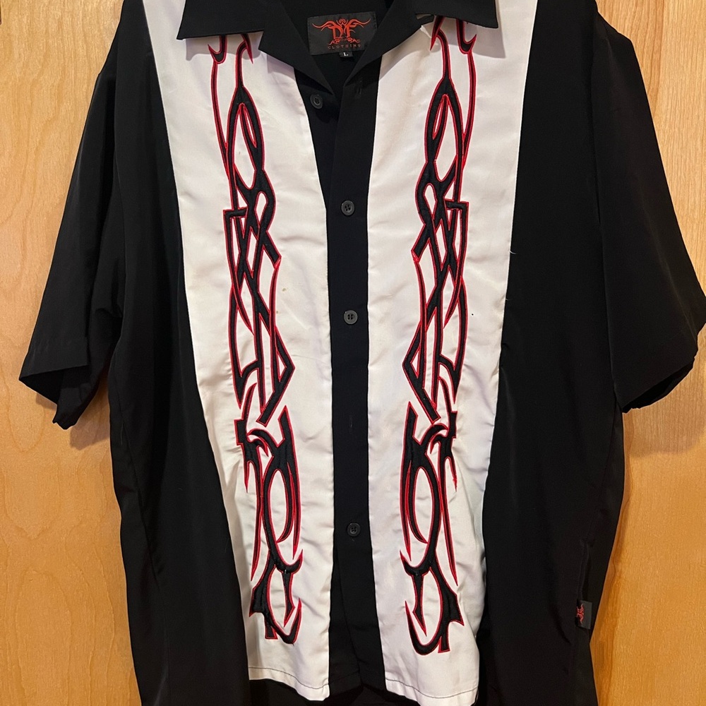 Black and White Button-Up Shirt with Red Accents